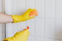 cleaning the bathroom tile