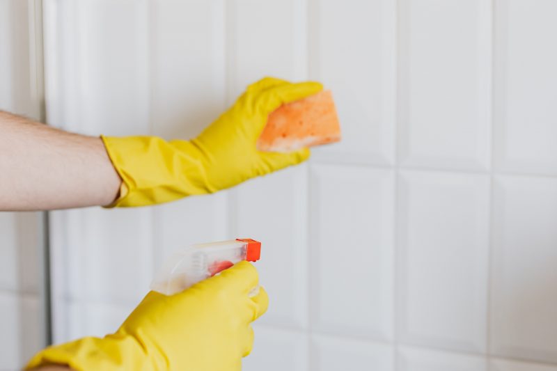 cleaning the bathroom tile